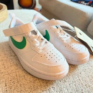 New with tag, kids size 11 Nikes.